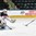 GRAND FORKS, NORTH DAKOTA - APRIL 23: Finland's Janne Kuokkanen #18 skates with the puck while USA's Joseph Woll #29 defends during semifinal round action at the 2016 IIHF Ice Hockey U18 World Championship. (Photo by Matt Zambonin/HHOF-IIHF Images)

